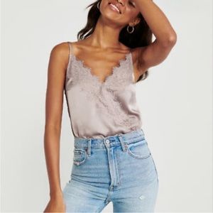Abercrombie Off white satin bodysuit with lace trim. EUC.